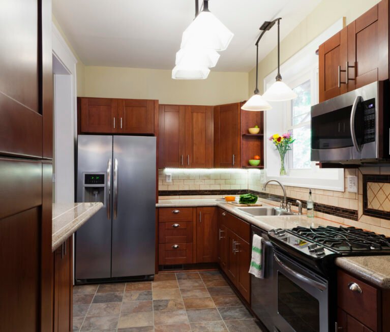 Appliances and cabinets in kitchen